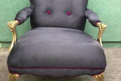 Charcoal velvet French armchair with gold frame and fuchsia buttons