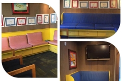 Pediatric office built-in bench seating — pink and blue vinyl with art walls