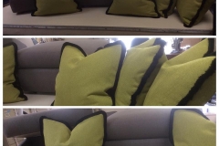 Set of chartreuse and green accent pillows with dark piping on sofa