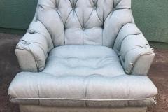Light blue tufted swivel rocker chair