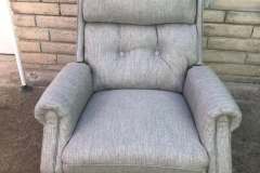 Gray heathered button-tufted recliner