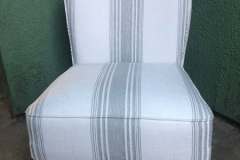 White and blue striped armless slipper chair with black turned legs