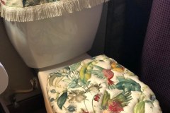 Custom tropical parrot-print toilet seat and tank covers