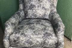 Gray botanical-print wingback club chair