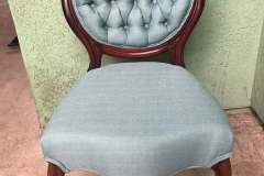 Teal tufted Victorian balloon-back parlor chair with cherry frame