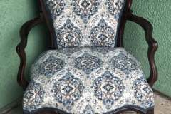 Blue and white damask Victorian armchair with carved frame